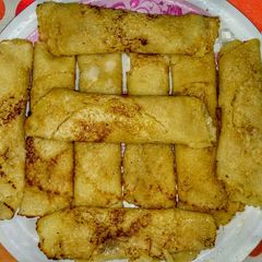 A picture of Patisapta Pitha/Mawa roll.