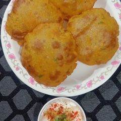 A picture of Spicy Aloo - Poha Puri.