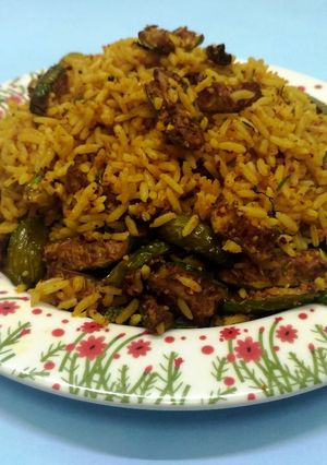 A picture of Ivygourd/Gherkin/Tendli Rice.