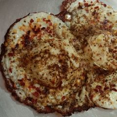 A picture of Masala Half Fry Eggs.