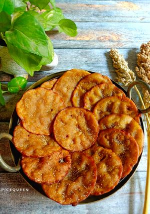A picture of Gujarati Malpua / Wheat flour and jaggery malpua.