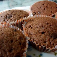 A picture of Chocolate Cup Cakes filled with Choco chips.
