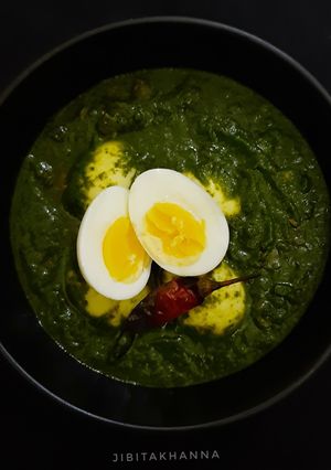 A picture of Palak Anda / Spinach Egg.