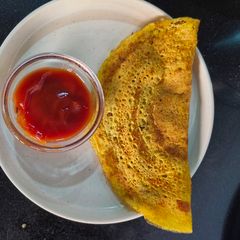 A picture of Stuffed moong dal wrap.