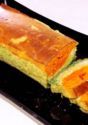 Une photo de Cake tricolore tomates, olives et épinards