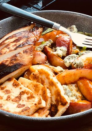A picture of Chili, honey grilled nectarine on blue cheese salad bed with grilled Halloumi & Grilled Chicken.