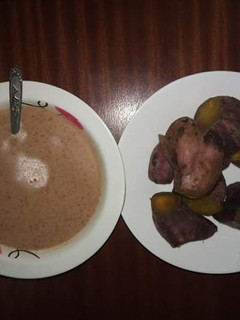A picture of Ndegu ya njugu (Ground nuts stew) na rabuon (sweet potatoes).