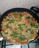 Arroz de molleja y corazón de pollo.