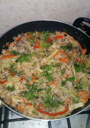 Una foto de Arroz de molleja y corazón de pollo.