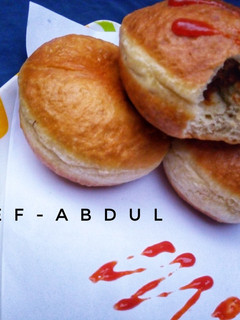 A picture of Meat filled doughnut.