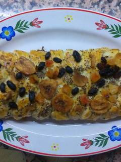 Una foto de Trenza de hojaldre, choco, membrillo, chía