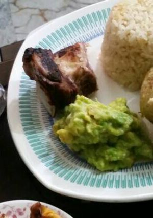 Una foto de Patata rellena y costilla al horno