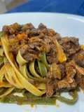 Fettuccine all' Uovo Paglia e Fieno con Tritato di Cinghiale Battuto al Coltello
