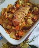 Petto di pollo arrosto su letto di patate e carote
