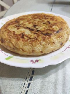 Una foto de Tortilla de patatas con cebolla