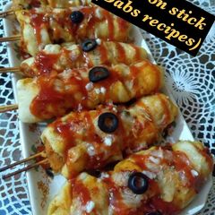 A picture of Pizza on stick.