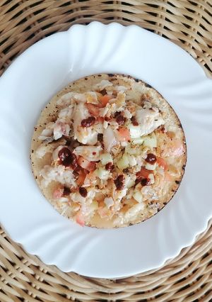 Una foto de Ceviche de pescado cocido 🐟