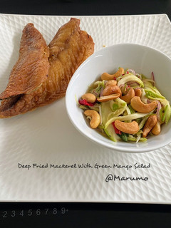 A picture of Deep Fried Mackerel With Green Mango Salad.
