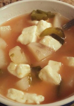 Una foto de Caldo de queso