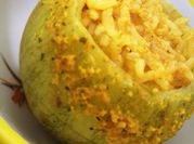 Una foto de zapallitos relleno con arroz