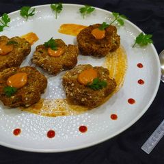 A picture of Walnut Puffed Rice kabab with walnut mayo dip.