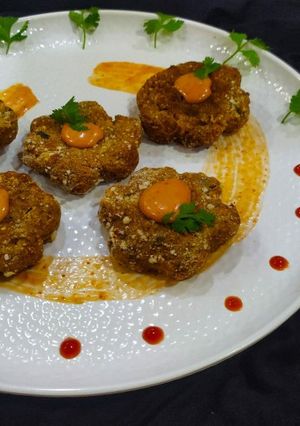 A picture of Walnut Puffed Rice kabab with walnut mayo dip.