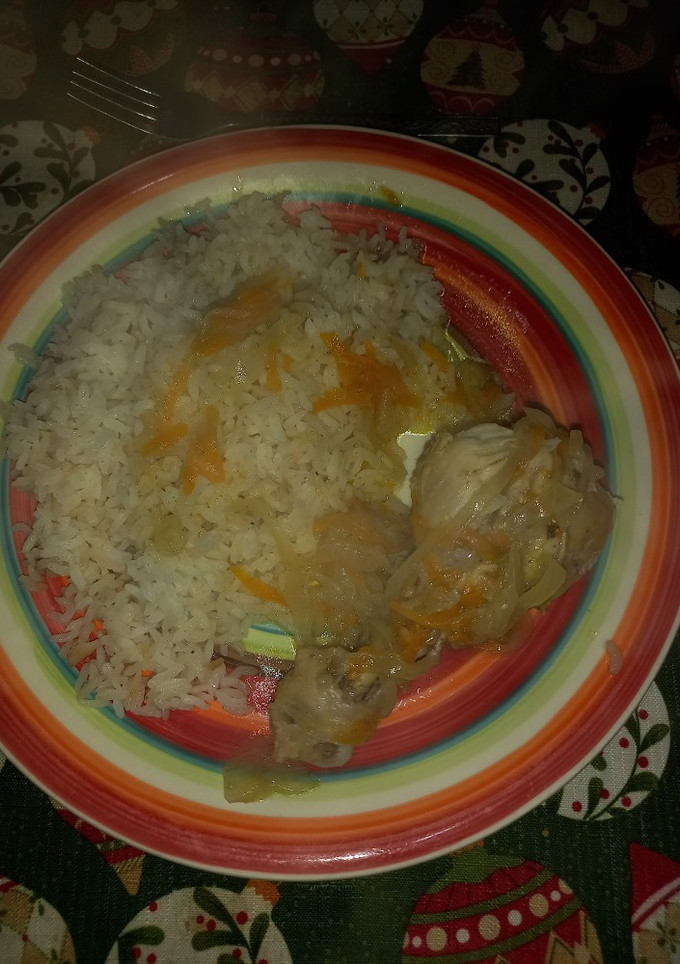 Una foto de Arroz con pollo al jugo