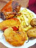 Cuy al horno con rocoto relleno