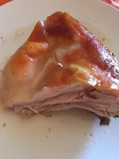 Una foto de Cochinillo asado