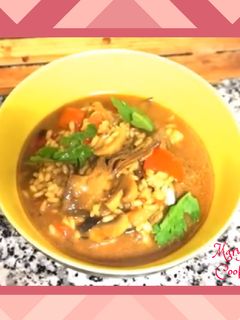 Una foto de Arroz caldoso con alcachofas