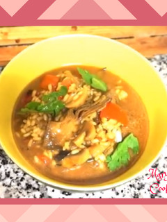 Una foto de Arroz caldoso con alcachofas