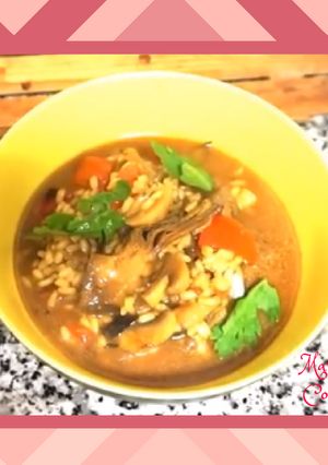 Una foto de Arroz caldoso con alcachofas