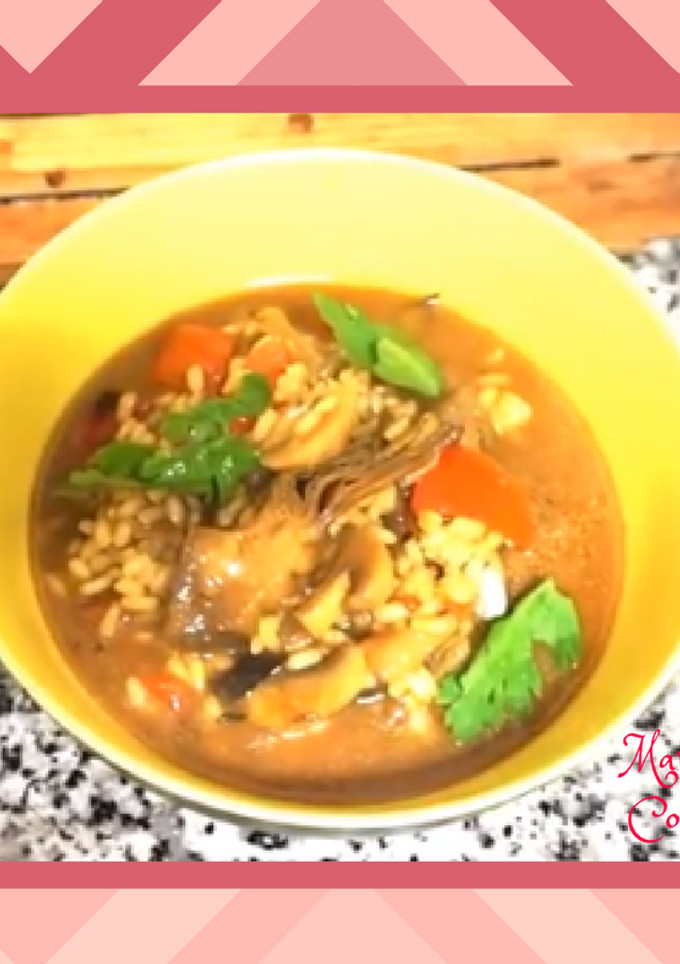 Una foto de Arroz caldoso con alcachofas