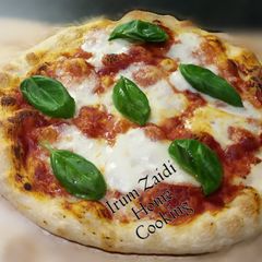 A picture of 🍕🍃🍕Authentic Italian Pizza Margherita🍕🍃🍕.