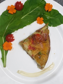 Una foto de Tortilla de papas (vegana)