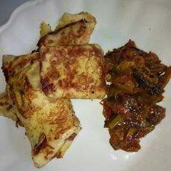 A picture of Crepes n tuna sauce.
