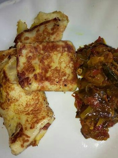 A picture of Crepes n tuna sauce.