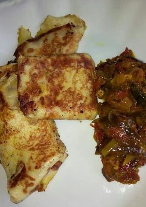 A picture of Crepes n tuna sauce.
