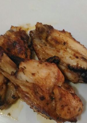 Foto di Alette e coscette di pollo al forno