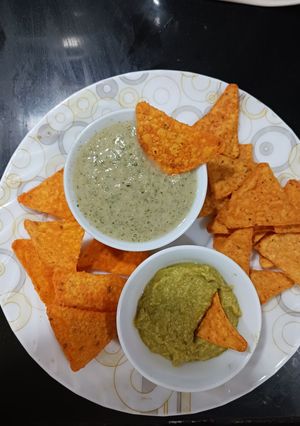 A picture of Nachos with Sweet and Spicy Dips.