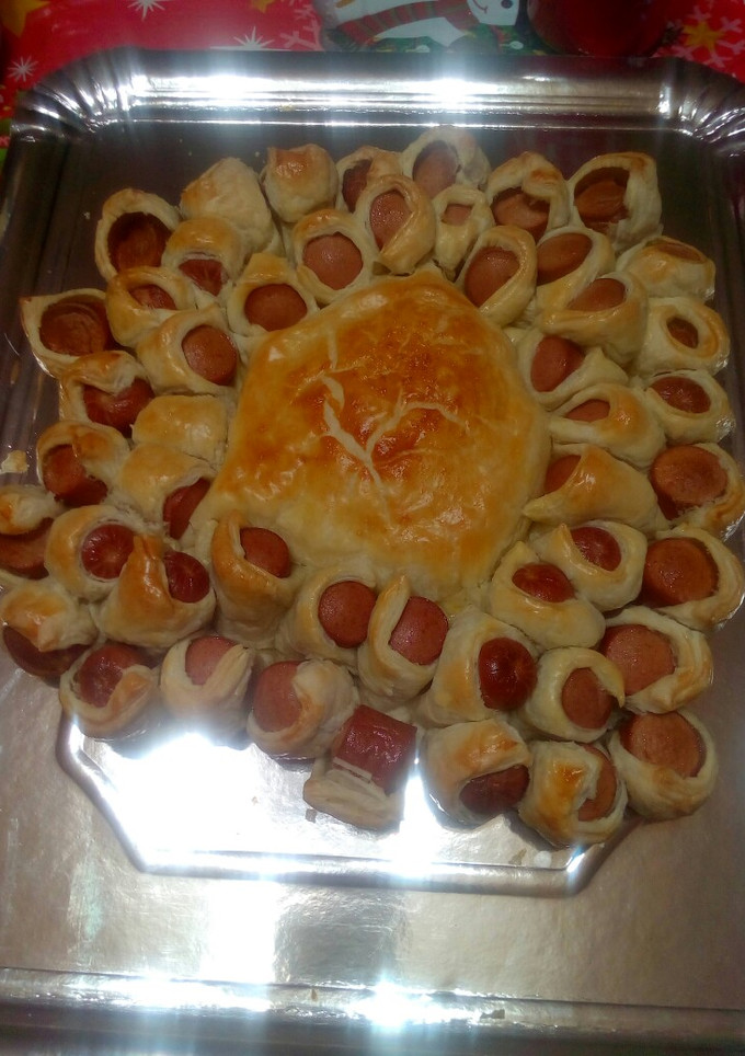 Una foto de Hojaldre de salchicha y camembert