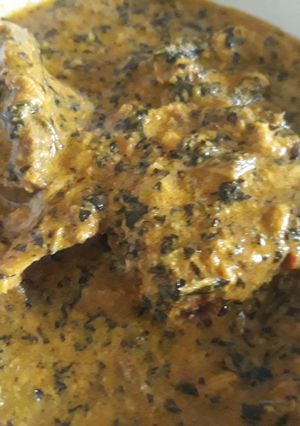 A picture of Egusi and bitterleaf soup.