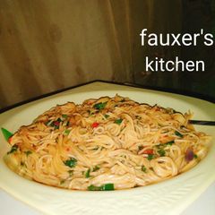 A picture of Spinach spaghetti jollof.