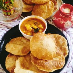 Puri Aloo sabji 🥰(Tari wale aalu sabji with puri 😋) A picture of Puri Aloo sabji 🥰(Tari wale aalu sabji with puri 😋).