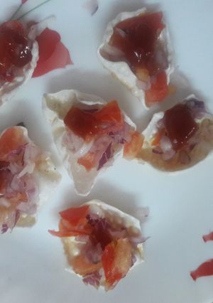 A picture of #rainbow#healthy snacks#saggo mini papad chat bytes.