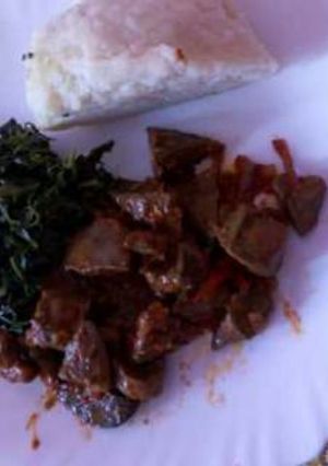 A picture of Fried liver raken with ugali.