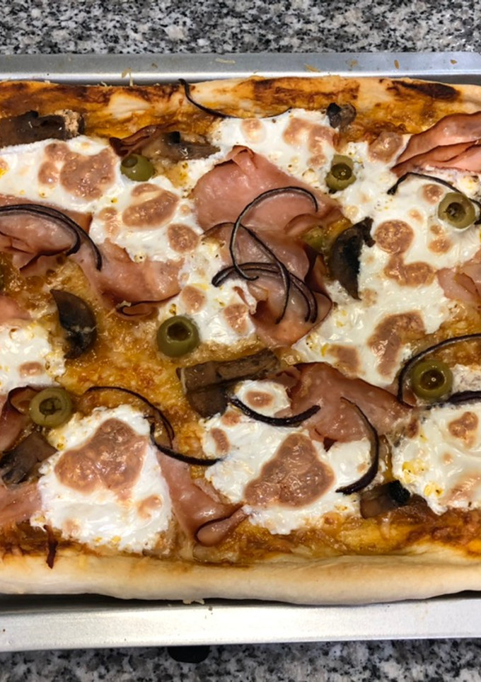 Una foto de Pizza