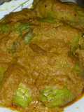 Potoler dorma (stuffed pointed gourd curry)