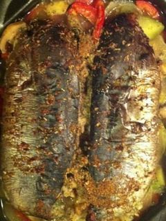 Une photo de Bonites au four tomates et courgettes