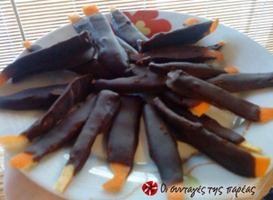 A picture of Chocolate strips with orange peel.